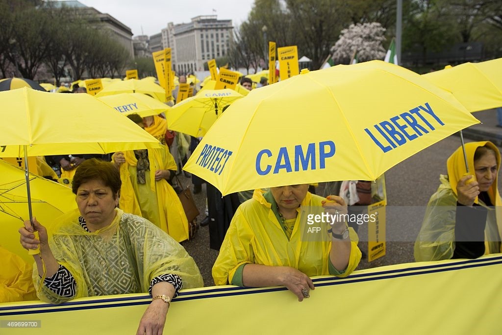 Iranian Americans and supporters protest the conditions at Camp Liberty, a former US military base in Iraq now used to house exiled Iranian dissidents, during a rally outside the White House in Washington, DC, April 14, 2015. The group wants the US and Iraq to ensure the safety and security of residents of the camp and for it to be declared a refugee camp under UN control. AFP PHOTO / SAUL LOEB (Photo credit should read SAUL LOEB/AFP/Getty Images)