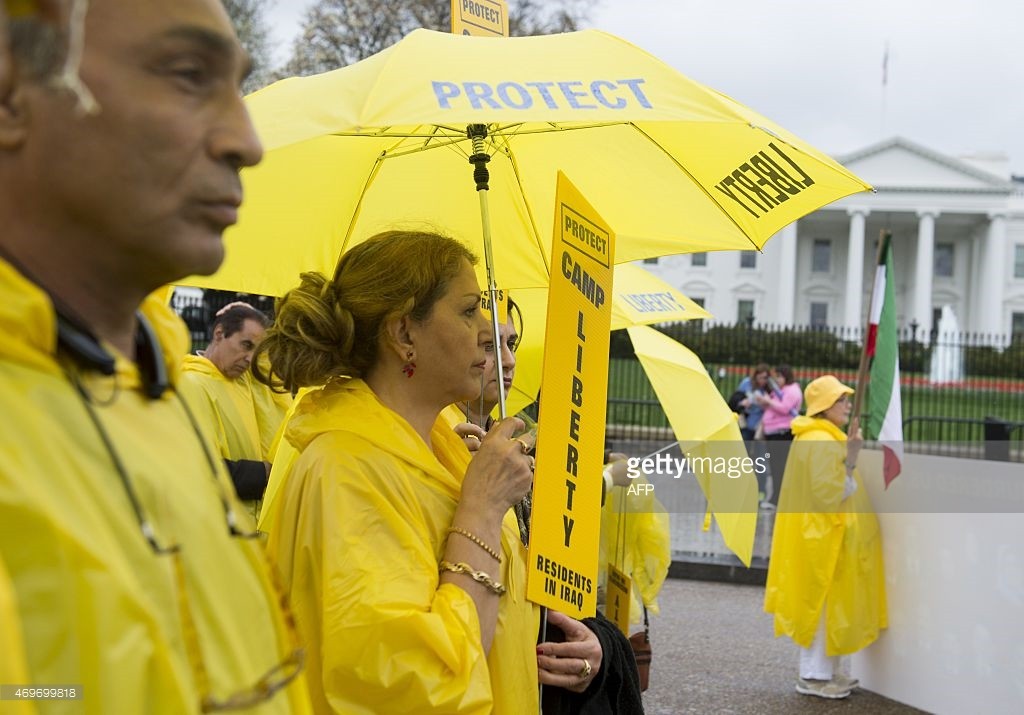 Iranian Americans and supporters protest the conditions at Camp Liberty, a former US military base in Iraq now used to house exiled Iranian dissidents, during a rally outside the White House in Washington, DC, April 14, 2015. The group wants the US and Iraq to ensure the safety and security of residents of the camp and for it to be declared a refugee camp under UN control. AFP PHOTO / SAUL LOEB (Photo credit should read SAUL LOEB/AFP/Getty Images)