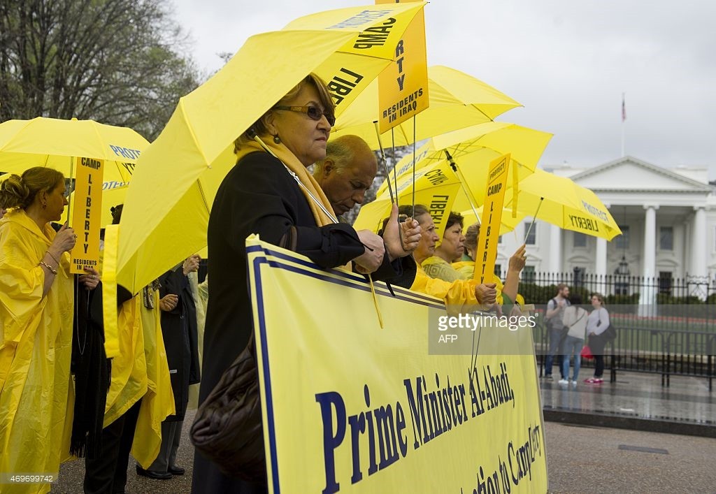 Iranian Americans and supporters protest the conditions at Camp Liberty, a former US military base in Iraq now used to house exiled Iranian dissidents, during a rally outside the White House in Washington, DC, April 14, 2015. The group wants the US and Iraq to ensure the safety and security of residents of the camp and for it to be declared a refugee camp under UN control. AFP PHOTO / SAUL LOEB (Photo credit should read SAUL LOEB/AFP/Getty Images)
